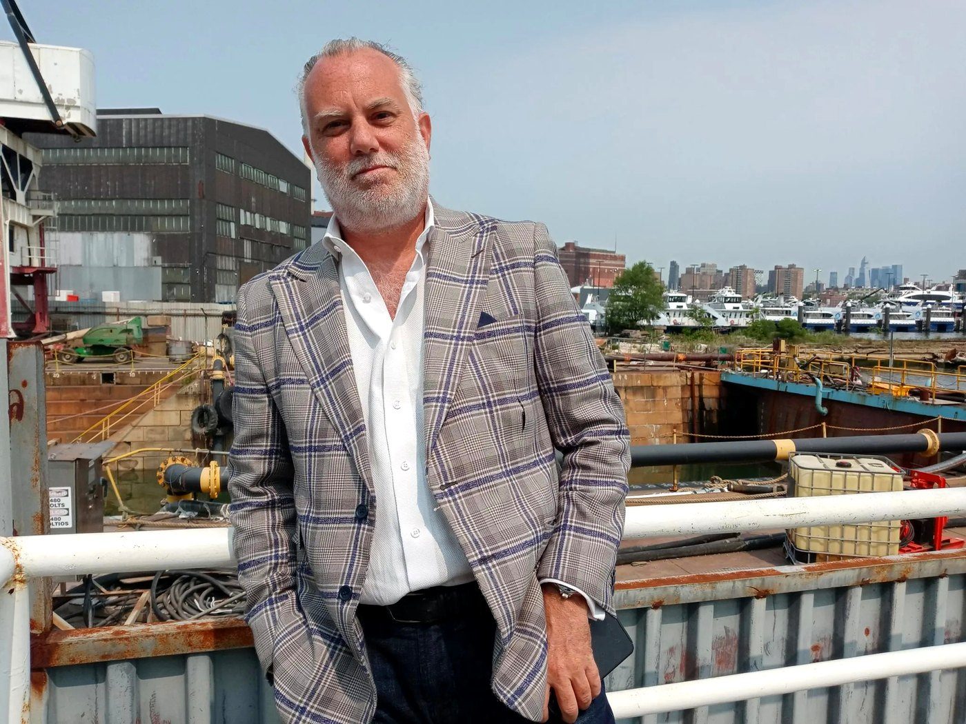 Harry Hayman on a rooftop above the skyline